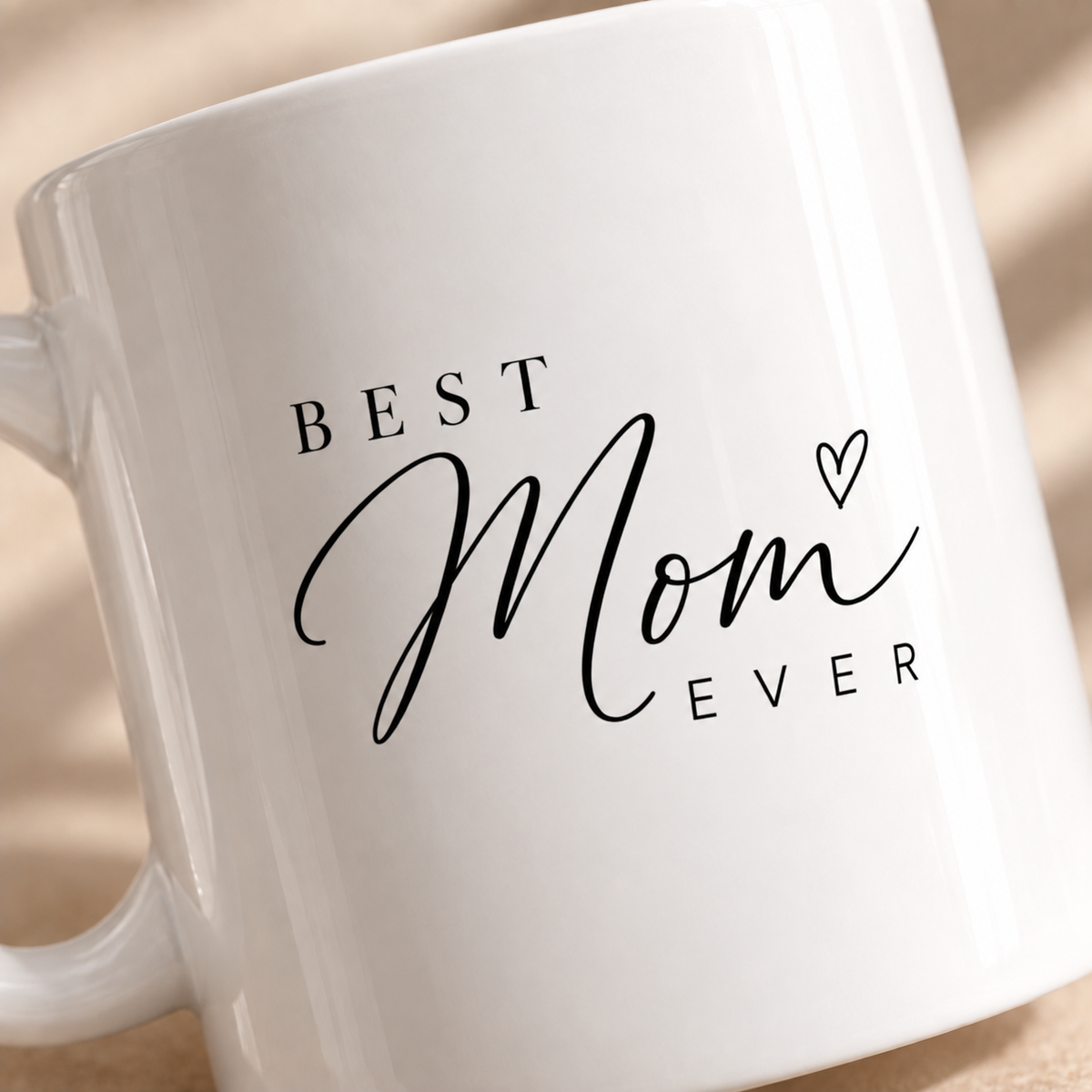 Close up of personalized Best Mom Ever mug with elegant handwritten lettering
